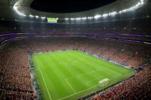 Estádio lotado da Copa do Mundo 2022 com torcedores, evidenciando o sucesso do time LaLiga supera oferta